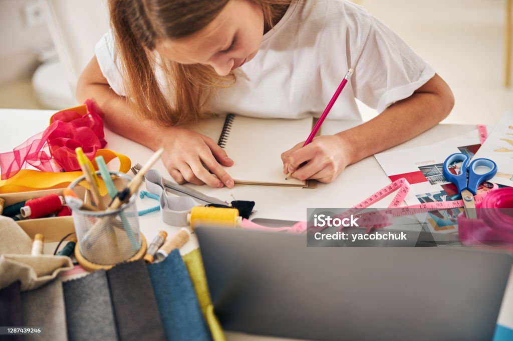 Noting Down Focused Creative Person Noting Down Her Ideas Stock Photo - Download ...