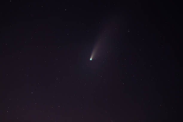 istock Comet NEOWISE or C/2020 F3 (NEOWISE) with cloud in the night sky. 1287440026