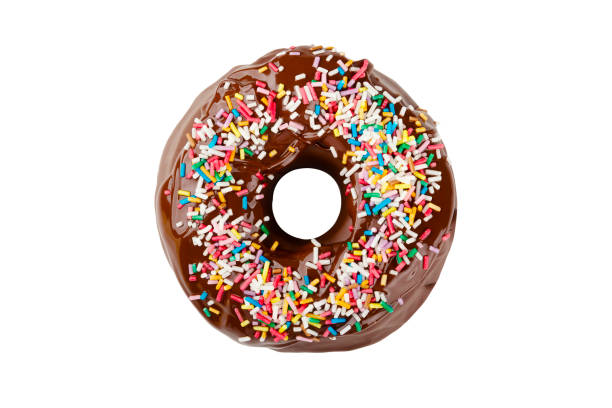 istock Donut covered with chocolate frosting and decorated with colored sprinkles isolated on a white background. Delicious colorful chocolate doughnut 1287440093