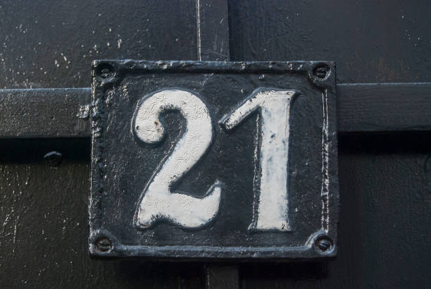 istock Old retro cast iron plate number 21 1287440129