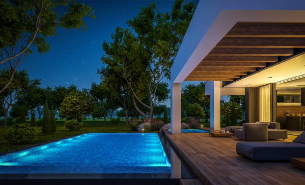 istock 3d rendering of modern house in luxurious style in night 1287443548