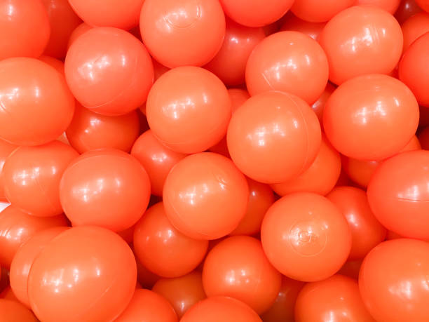 istock Light red Plastic ball, kid toy indoor pool ball 1287443685