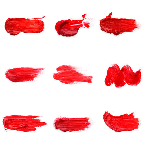istock Red colored brush stroke paiting over isolated background, canvas watercolor texture, red lipstick smudge 1287445528
