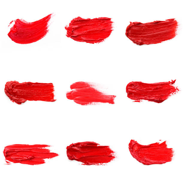 istock Red colored brush stroke paiting over isolated background, canvas watercolor texture, red lipstick smudge 1287445543