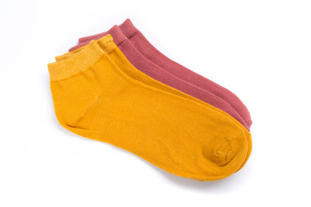 istock two pairs of cheerful colored short socks on a white background, top view 1287445807