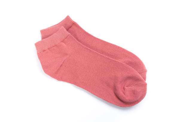 istock Pair of cute short socks on white background, top view 1287446565