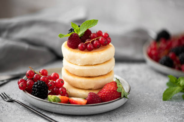 istock cottage cheese pancakes with fresh berries and mint 1287447401