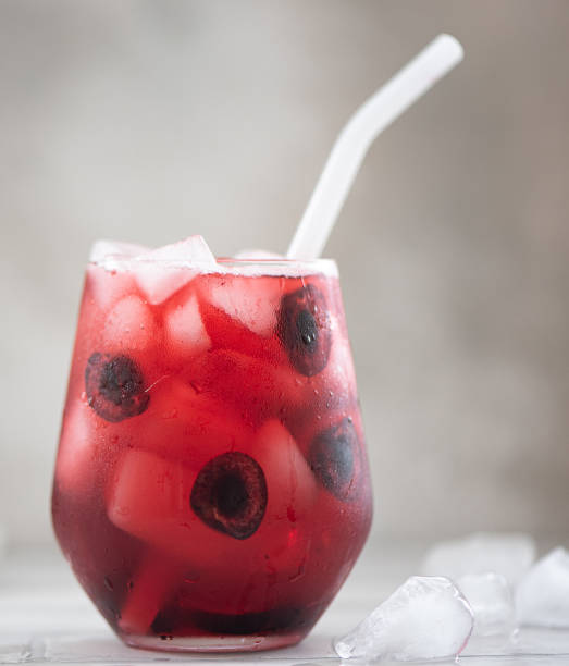 istock fresh cherry juice with ice and sweet cherry halves 1287447715