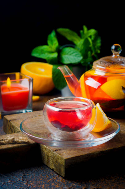 istock flavored Fruit red Tea in glass cup and kettle, tea ceremony 1287448526