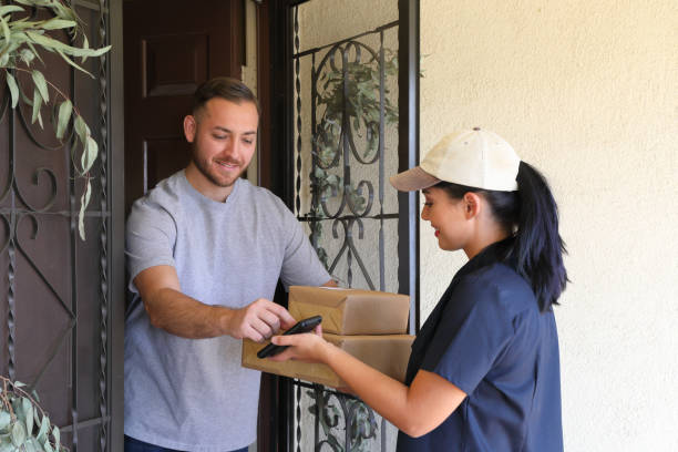 istock Package Delivery for Man He Signs 1287449007