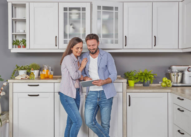 istock Couple looking at the tablet 1287449142