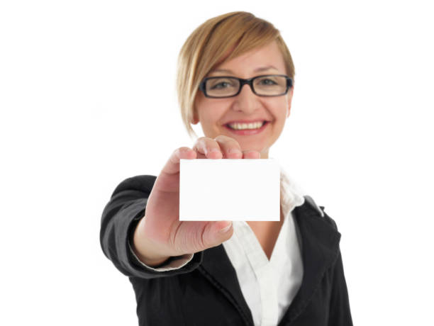 istock Woman showing her business card 1287450436