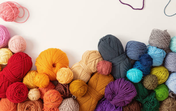 Colorful balls of yarn for knitting and crochet stock photo