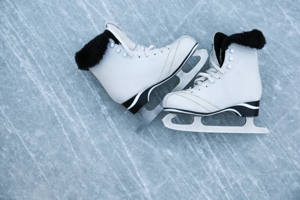 istock figure skating skates are on the rink 1287454995