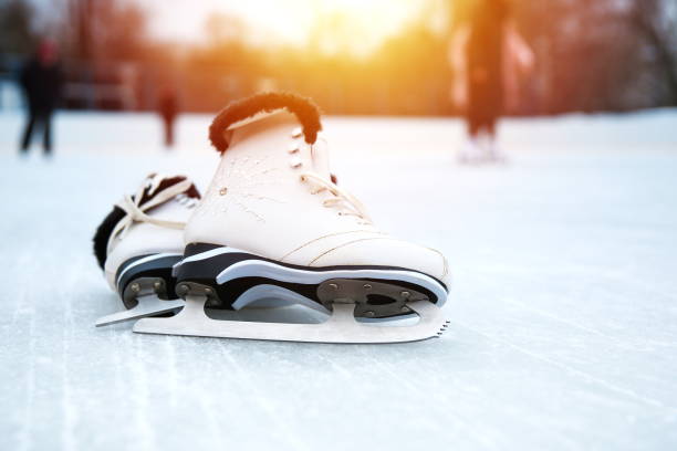 istock figure skating skates are on the rink 1287455030