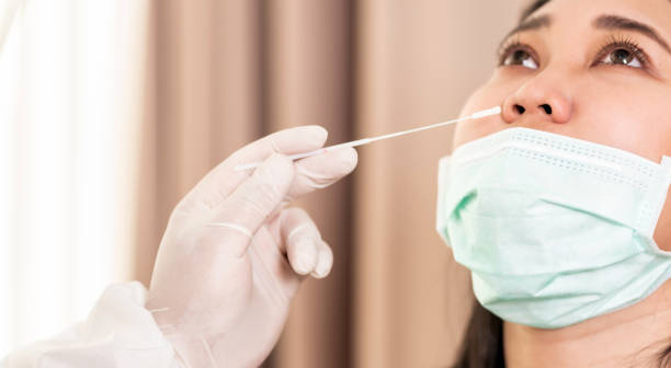 istock Medicla staff do COVID-19 testing Panorama 1287455107