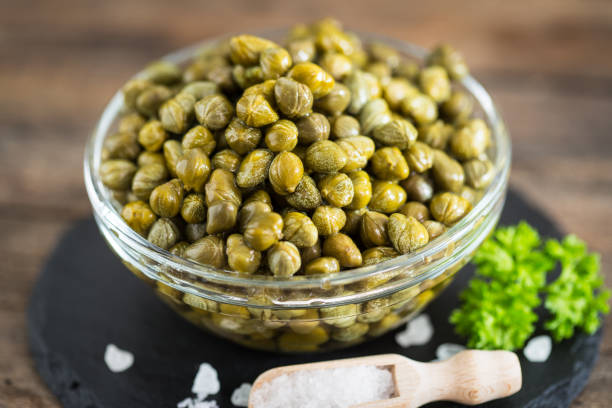 istock Fresh caper in the glass bowl 1287457711