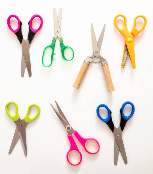 istock Scissors set on white background, School preschool supplies, top view 1287458705