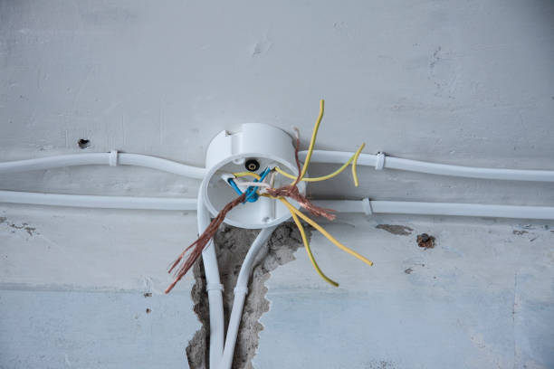 istock Electrical wiring, wiring, on a plastered wall. 1287460884