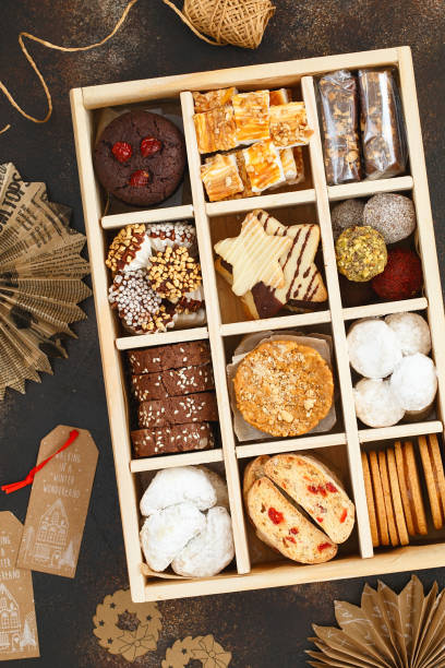 istock Christmas Shortbread Biscuits Cookies Assortment. Holiday Cookie Box. Assorted Christmas homemade cookies in wooden box. Sweet biscuits in a big wooden box. Christmas dessert table. Gift idea 1287462344