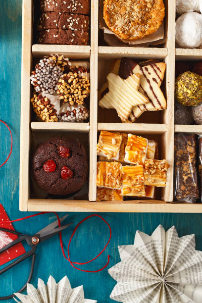 istock Christmas Shortbread Biscuits Cookies Assortment. Holiday Cookie Box. Assorted Christmas homemade cookies in wooden box. Sweet biscuits in a big wooden box. Christmas dessert table. Gift idea 1287462392