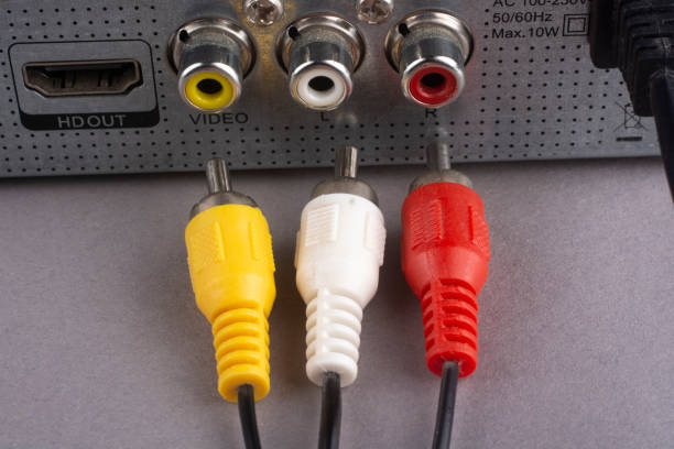 Yellow, white, red, RCA plug with black cable connect to audio and video. Yellow, white, red, RCA plug with black cable connect to audio and video. RCA Cables online stock pictures, royalty-free photos & images