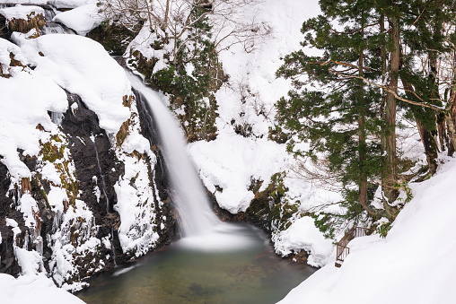 Shirogane Falls in winter near Obanazawa, Yamagata Prefecture, Japan hot springs town in winter season.
