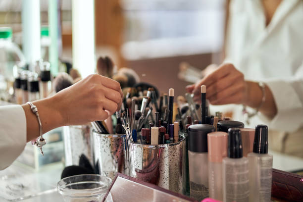 istock Professional modern makeup artist choosing the right makeup brush 1287464055