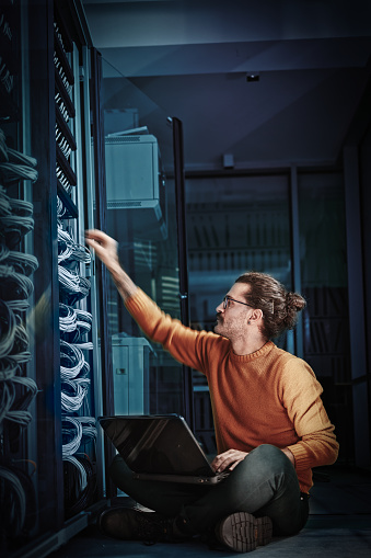 IT worker checking the server