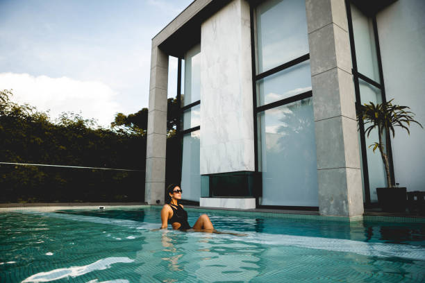 istock women enjoying luxury pool 1287465143