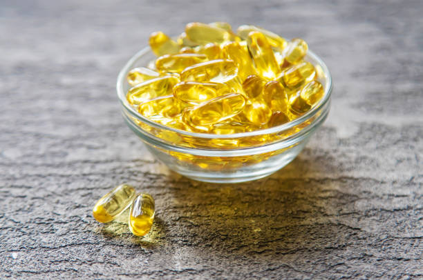 istock Omega-3 fish oil capsules. Selective focus 1287466942