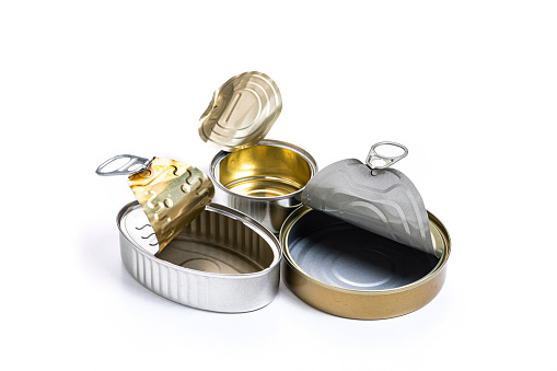 Recycling concepts: three open steel tins of food isolated on white background. The tins are of different shapes and sizes. High resolution 42Mp studio digital capture taken with Sony A7rII and Sony FE 90mm f2.8 macro G OSS lens