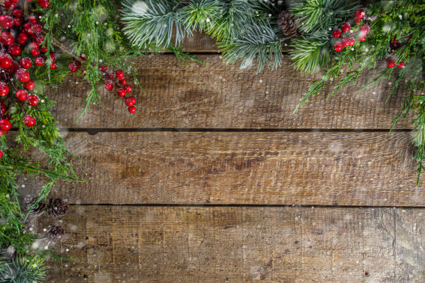 istock Christmas Fir Tree On Wooden Background 1287468270