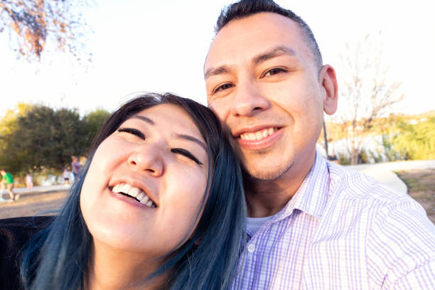 istock Asian Female And Hispanic Male Selfie 3 1287470132