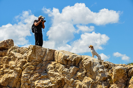 Athens, Greece - June - 2019. Dog photoshooting at the top of the hill