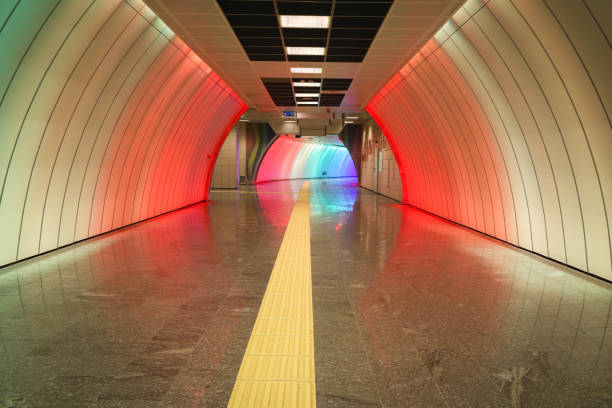 istock Multicolored and Modern Subway Corridor in a Metro Station 1287472444