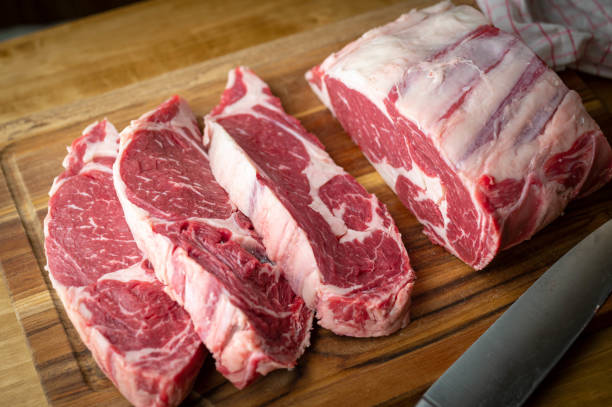 istock sliced chunk of rib eye for thick cut steak 1287472858