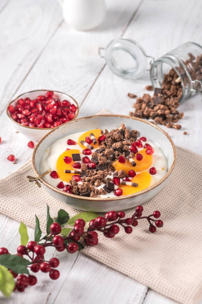 istock Granola with fresh apricots and pomegranate 1287475114