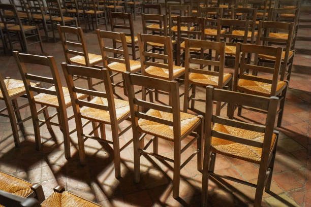 istock Chairs in a cozy chapel 1287478454