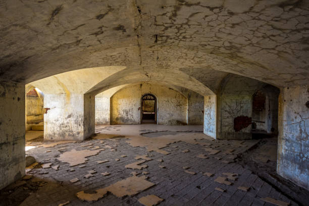 istock Dark and creepy vaulted dungeon 1287479350
