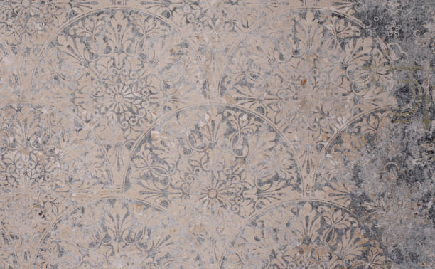 istock Old gray vintage shabby patchwork tiles stone concrete cement wall texture background banner 1287479632