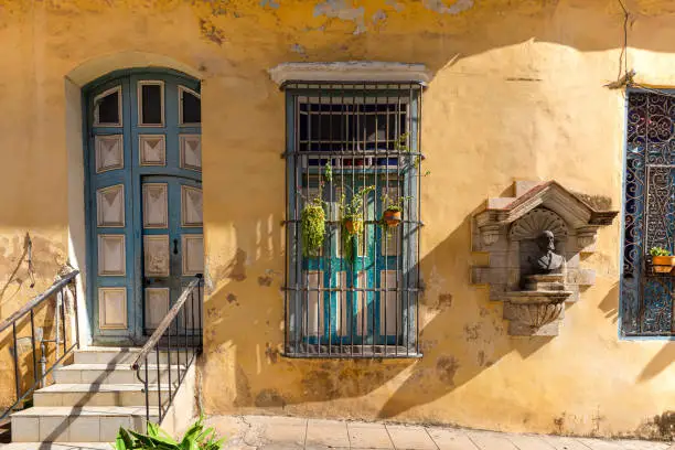 Scenic colorful Old Havana streets in historic city center (Havana Vieja) near Paseo El Prado and Capitolio