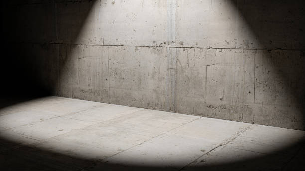istock Empty abstract concrete studio for display of products against background, with spotlight 1287484903
