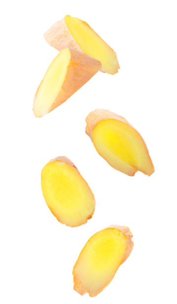 Ginger fruits isolated in the air on white background stock photo