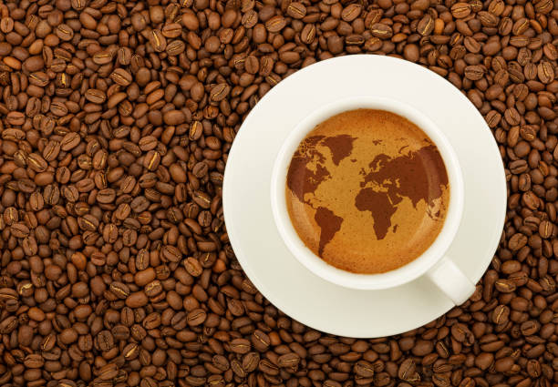 istock Espresso cup with world map on coffee froth crema 1287488906