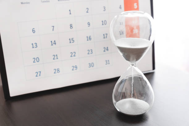 istock Time passing concept, time slipping away 1287490172