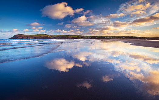 Reflected clouds at sunrise in Pembrokeshire, Wales