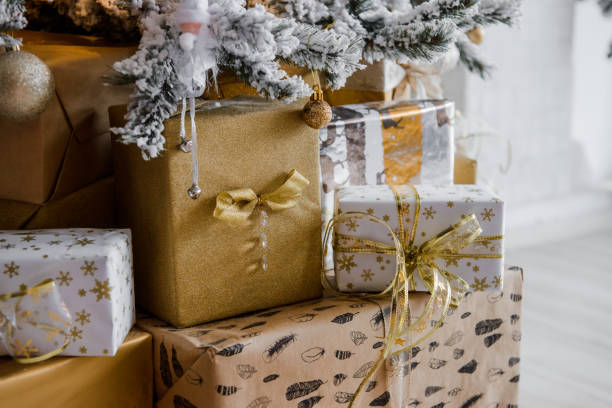 istock Boxes of presents under the Christmas tree 1287494944