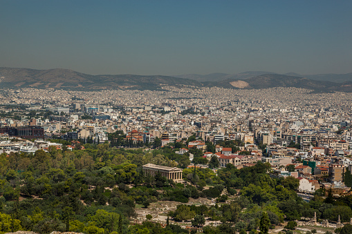 Partial view of Athens city from the Acropolis hill with the temple of Hephaestus.