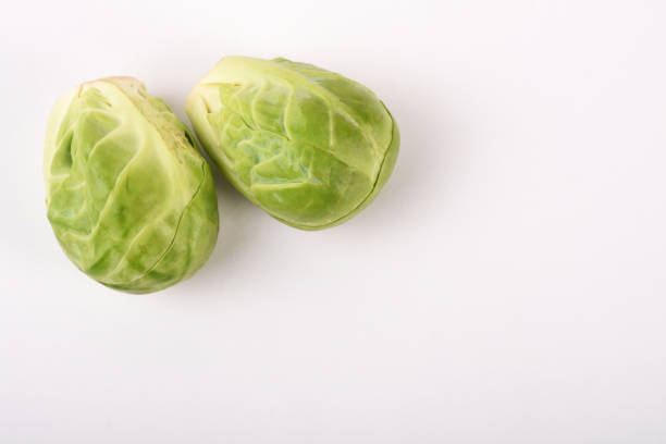 Fresh Brussels sprouts isolated on the white background with copy space